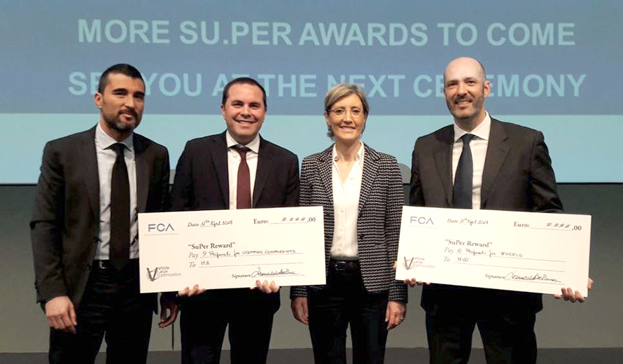 Paolo Bartoli, Chief Commercial Officer for automotive components of CLN Group, receives the awards on behalf of MW from the FCA team.